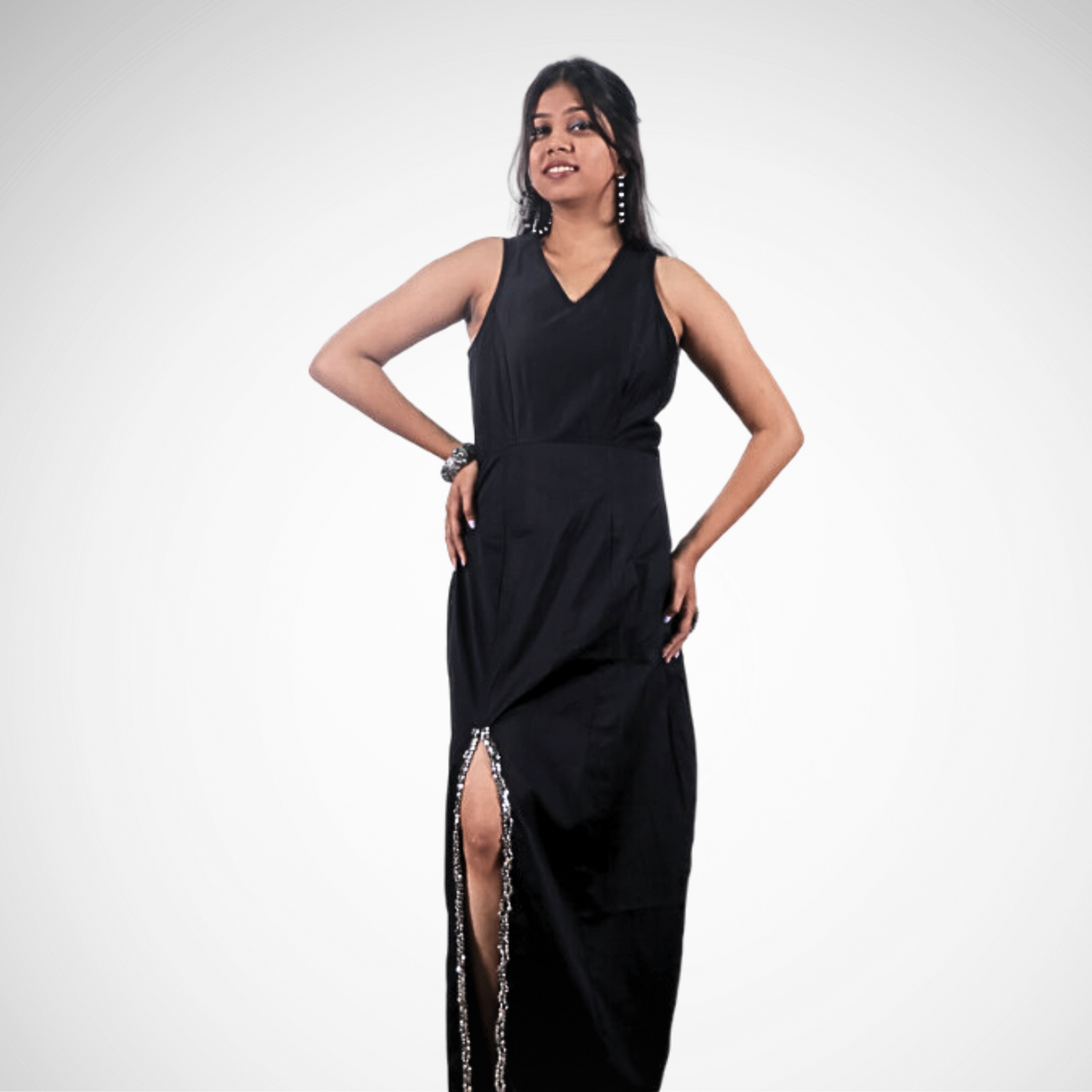 Black sleeveless gown with beaded slit
